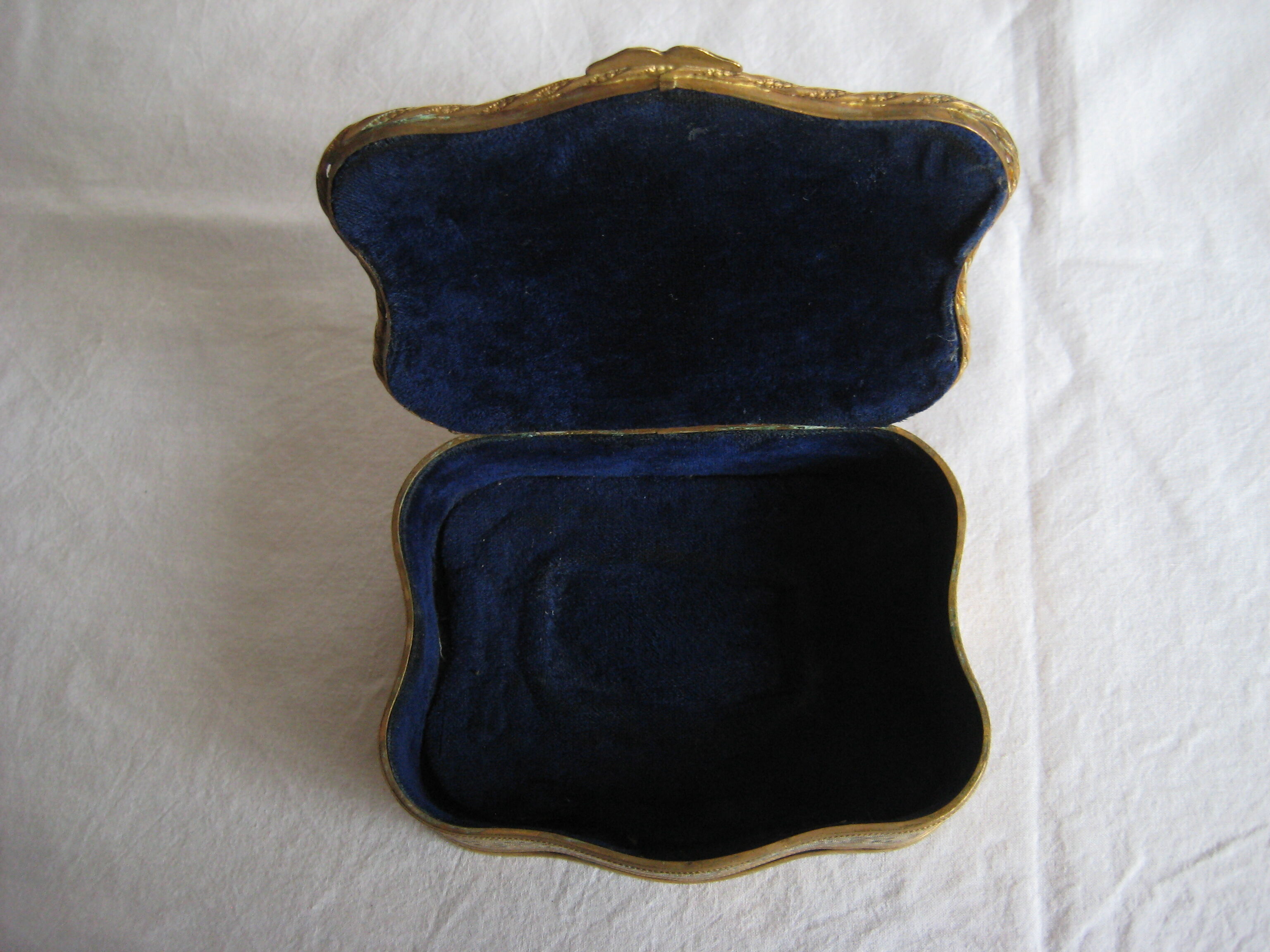 Brass jewelry box asked with porcelain betting