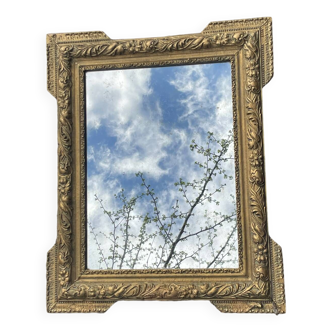 Mirror in wood and gilded stucco