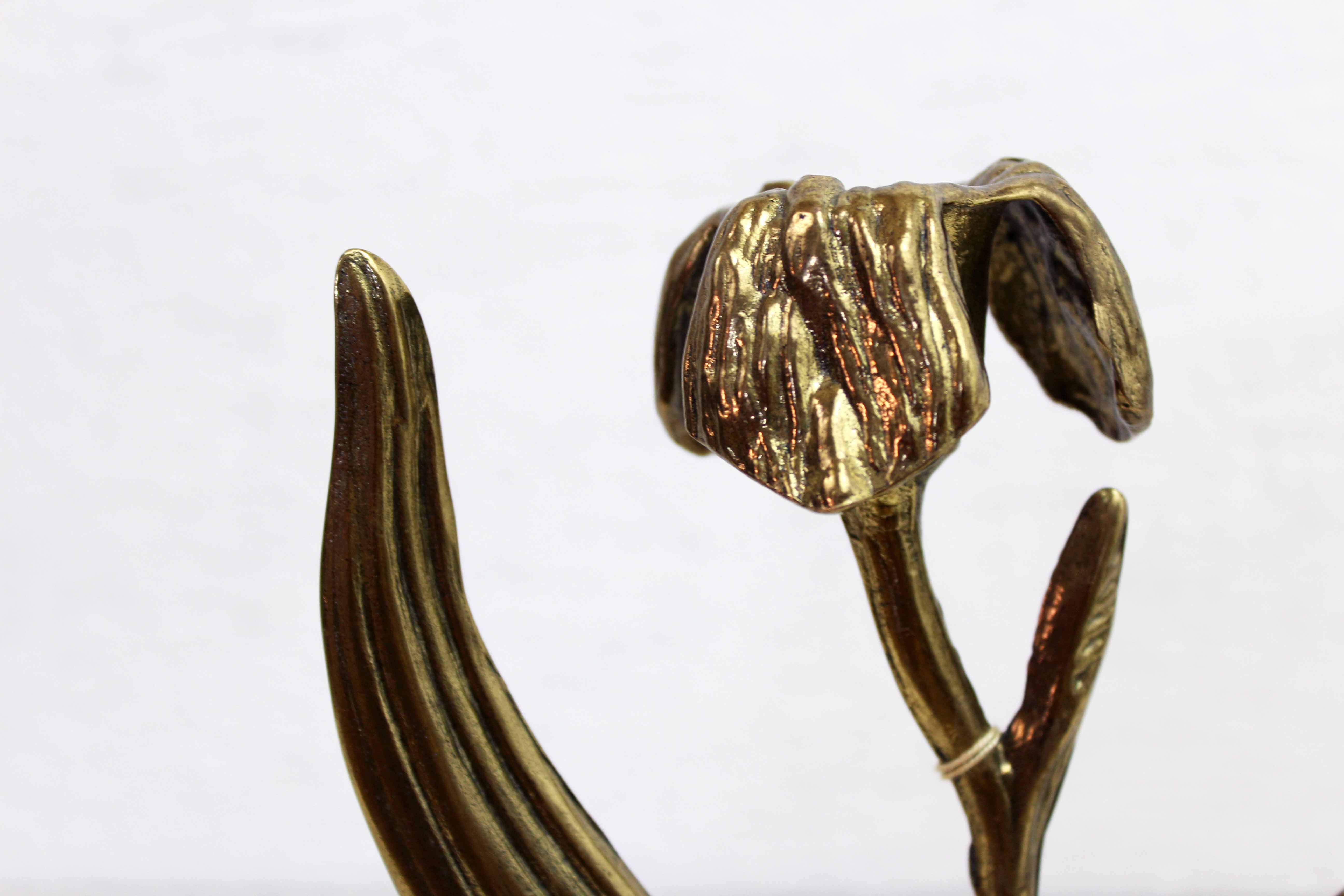 Art Nouveau brass flower candle holder