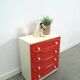 Vintage ladekast met rood roze kunststof lades 1970