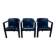 Suite de 3 fauteuils design cuir et métal.