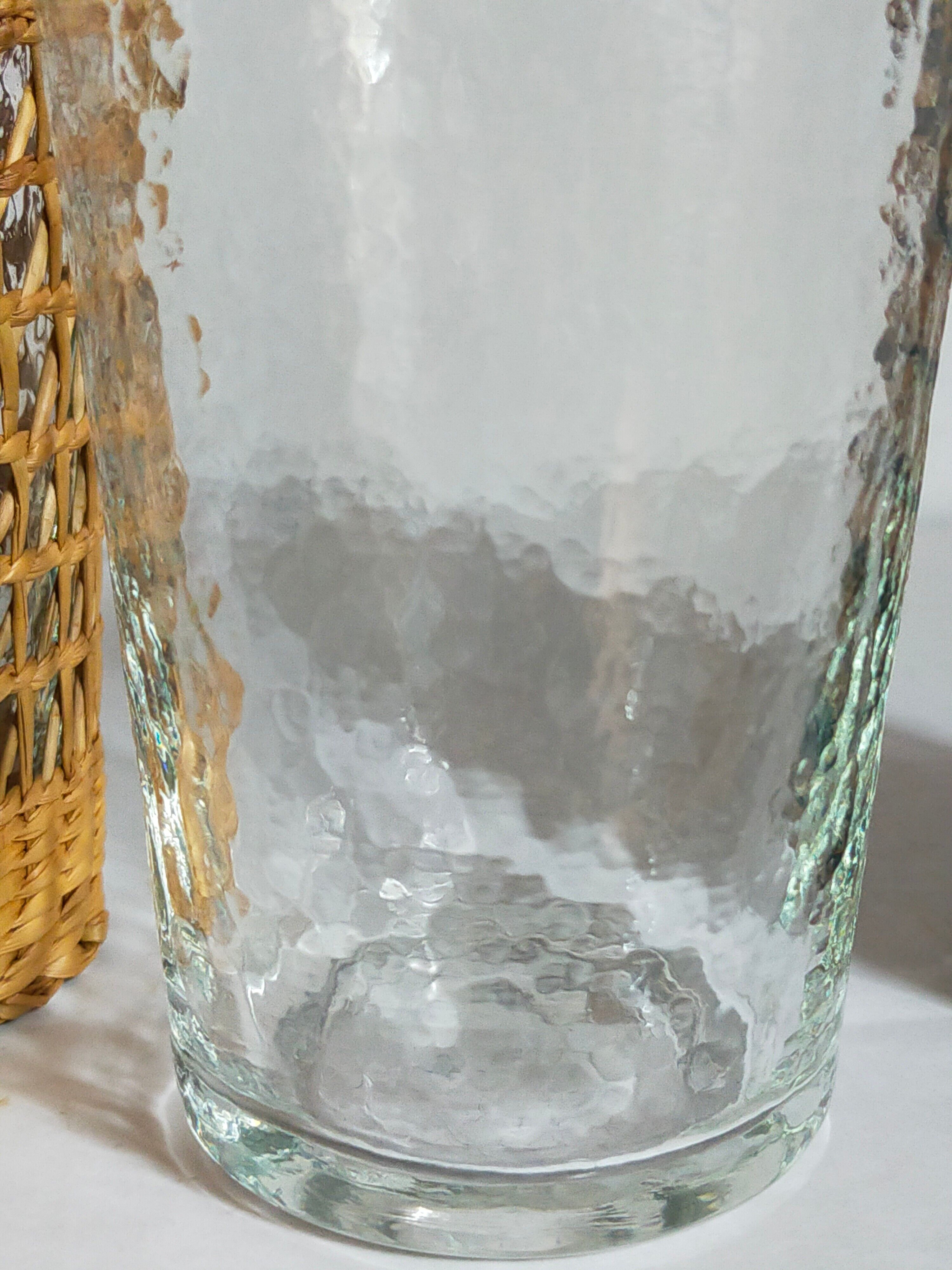 Four long drink glasses in vintage woven rattan cases