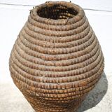 Old basket, burgundy straw and bramble, woven basket, interior decoration