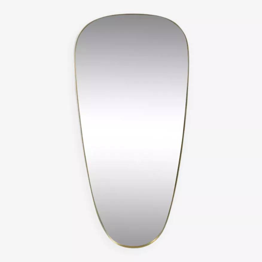 Rear view mirror and free form brass outline