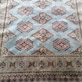 Old oriental carpet made hands. Signature. (175 x 125 )