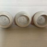 9 marble candle holders of different sizes