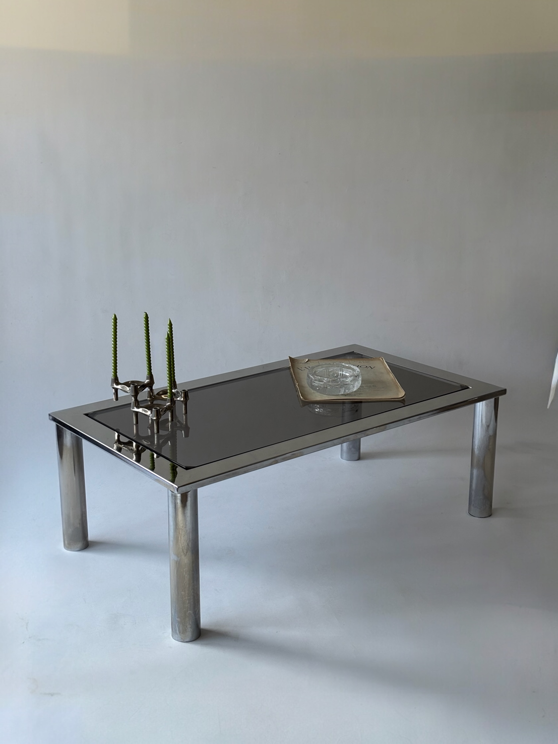 Chrome metal and smoked glass coffee table, 1970.