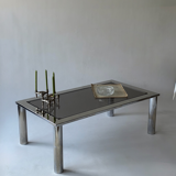 Chrome metal and smoked glass coffee table, 1970.