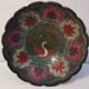 Old Indian brass bowl with peacock decoration