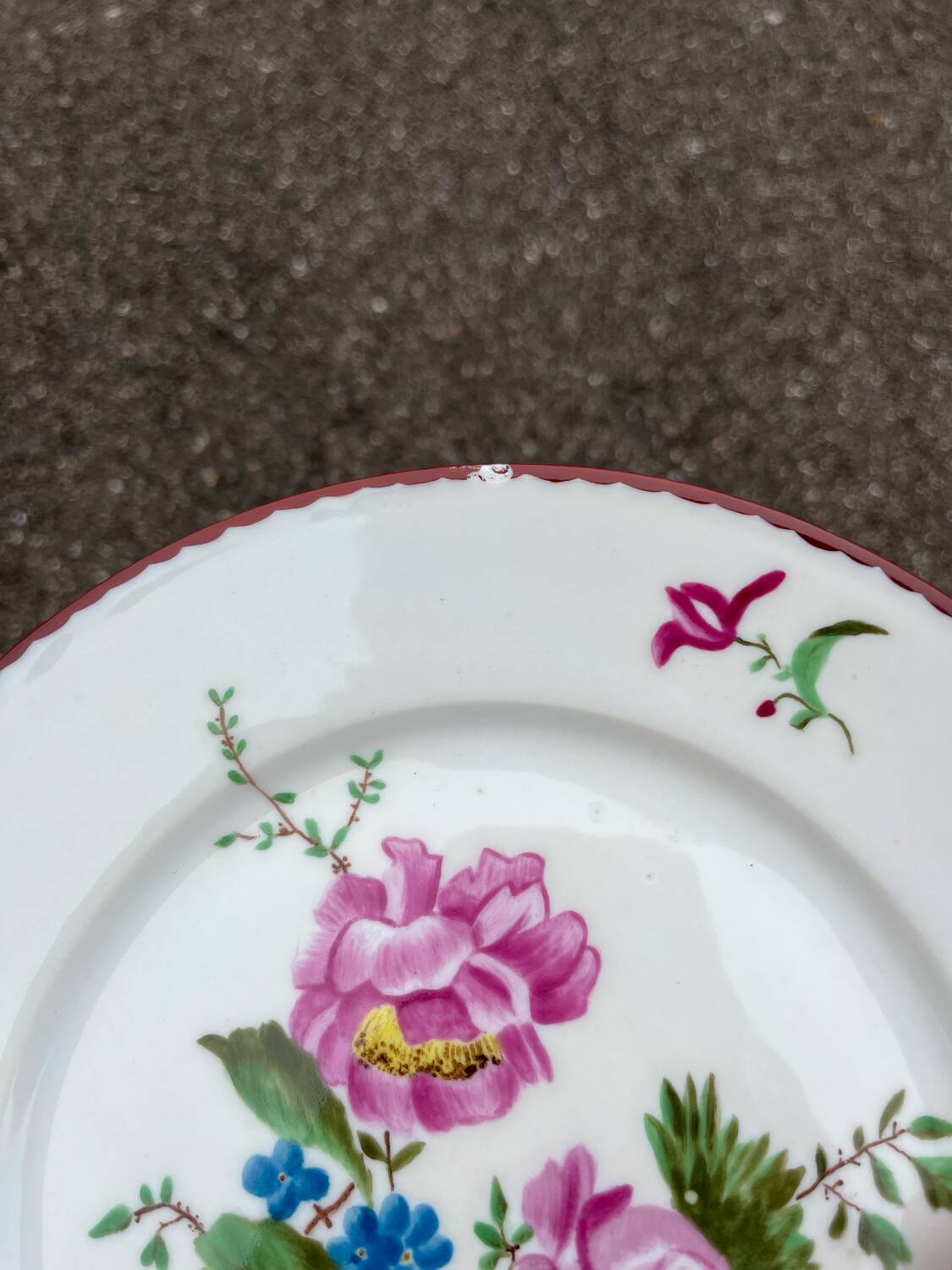 Pair of painted and signed Limoges porcelain plates