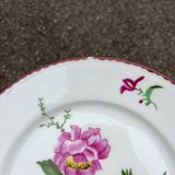 Pair of painted and signed Limoges porcelain plates