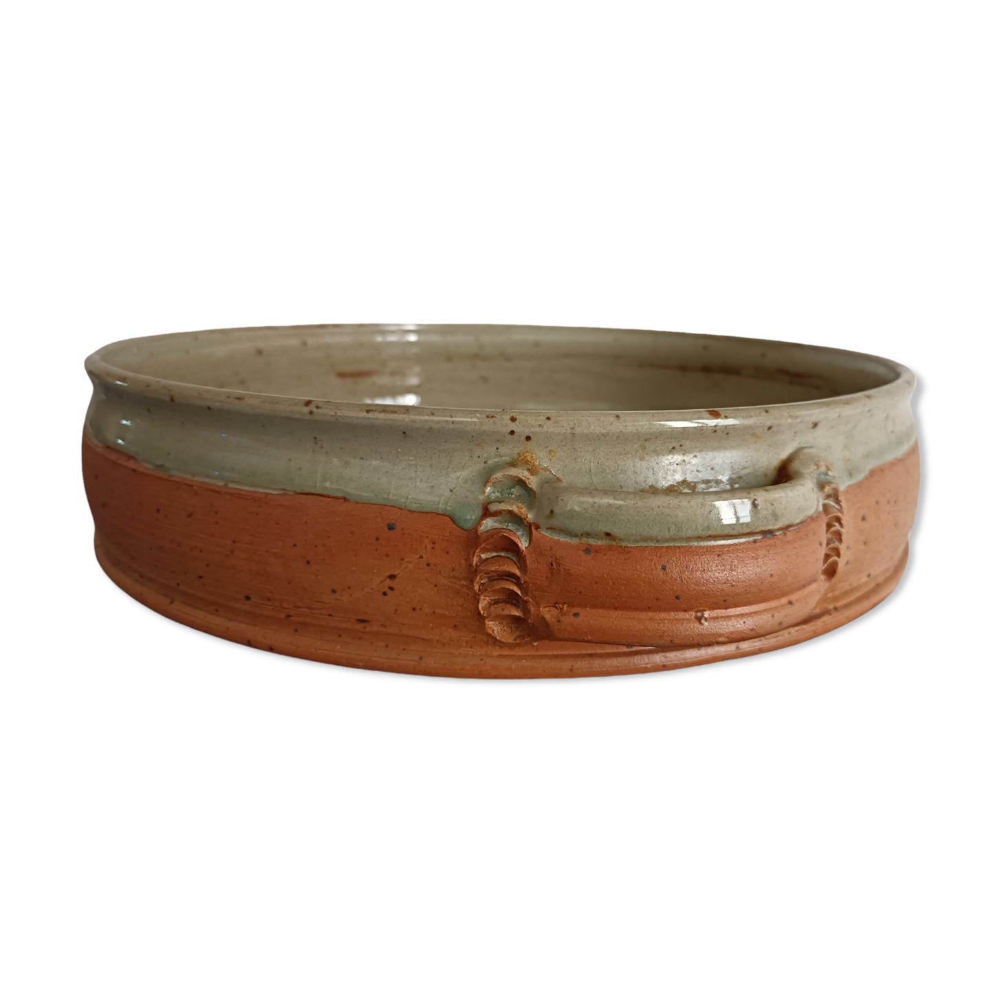 Large glazed terracotta dish.