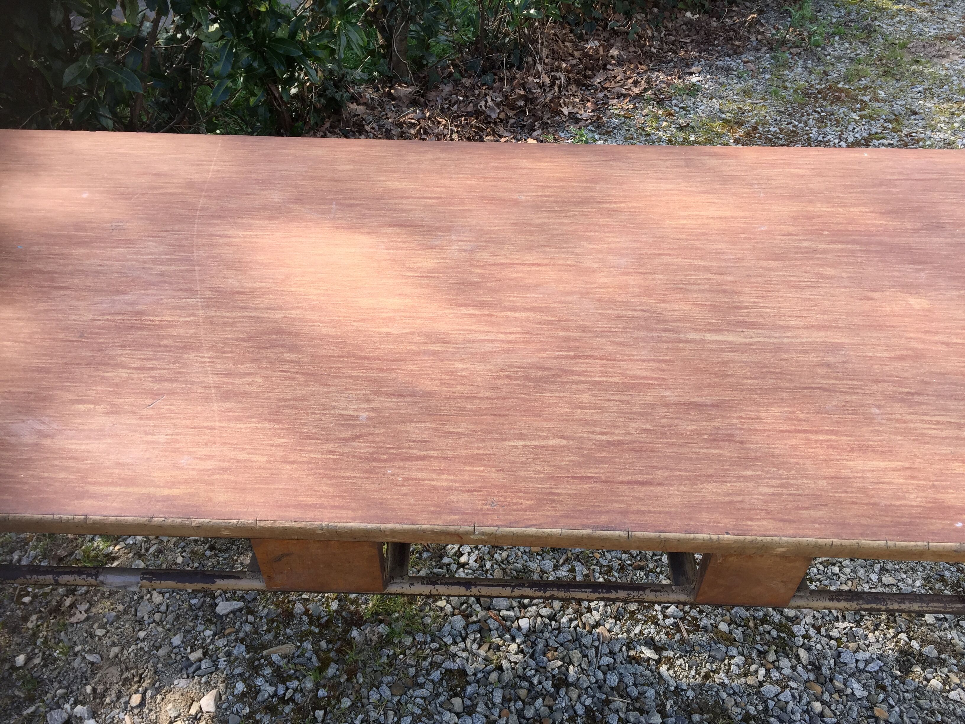 Vintage modernist table with metal tubular base