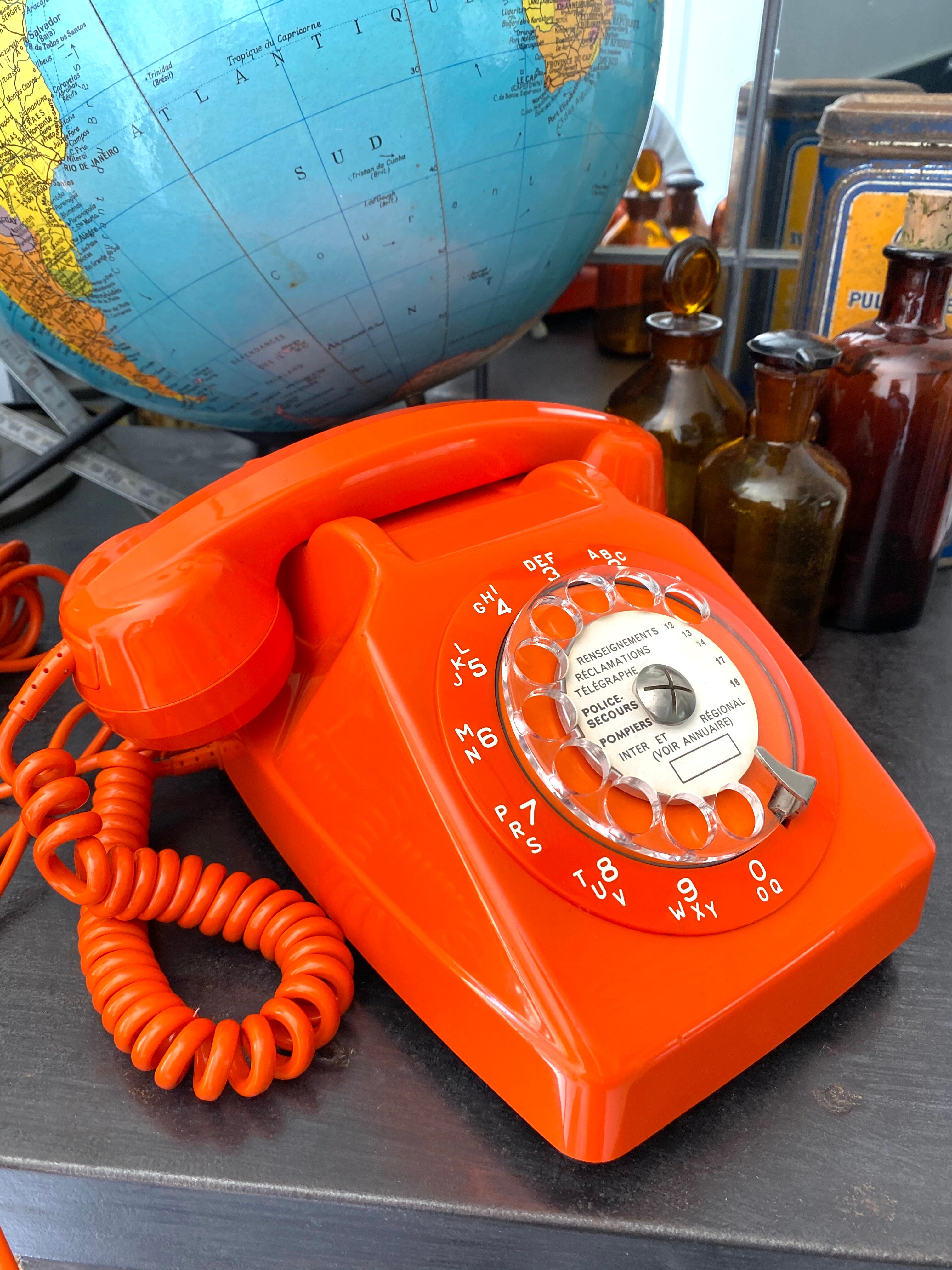 Orange vintage dial phone