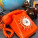 Orange vintage dial phone
