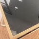 Golden dessert on wheels with black glass trays