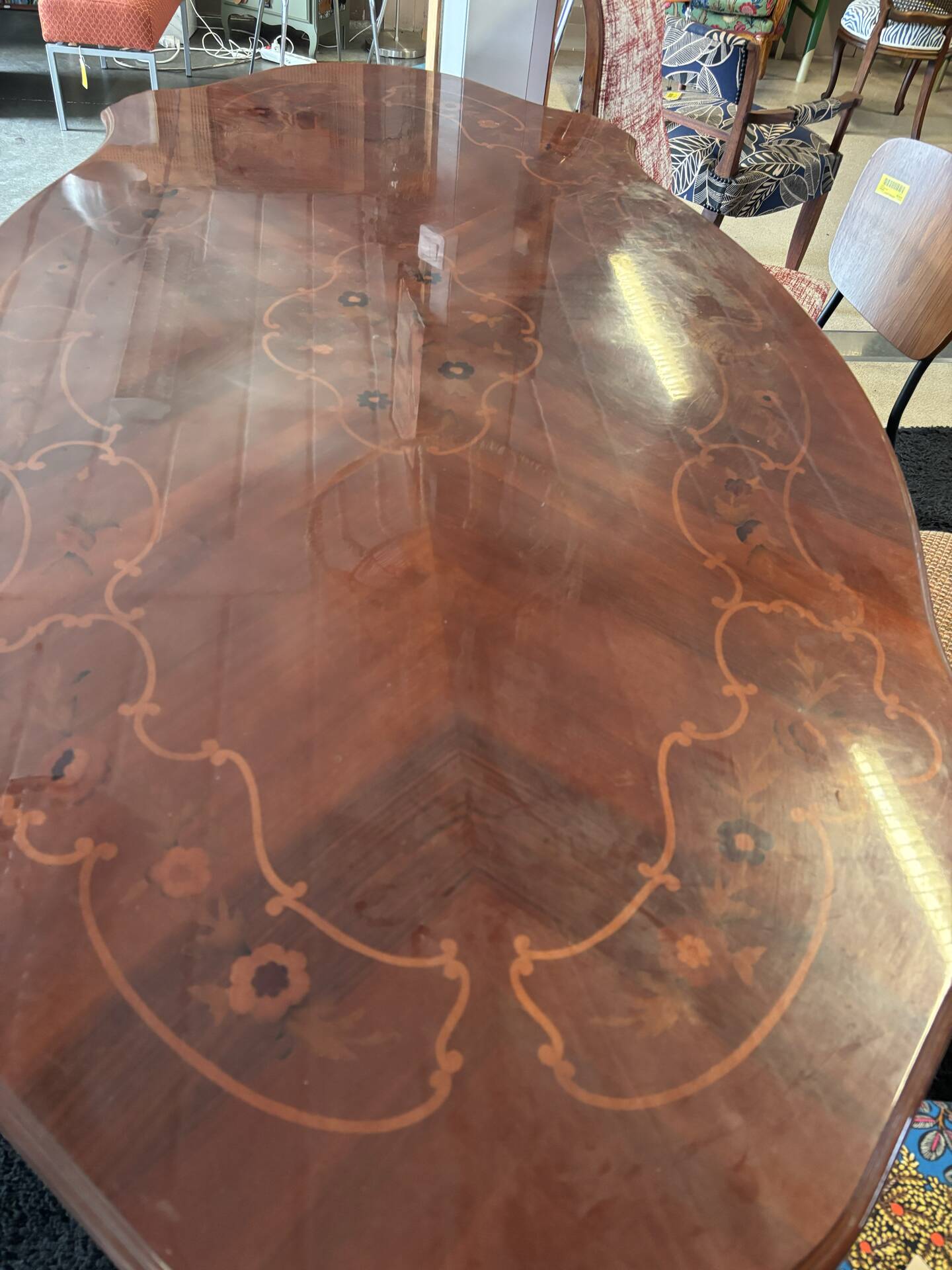 Oval table with marquetry top