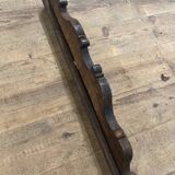 Cornice pediment in low relief in wood
