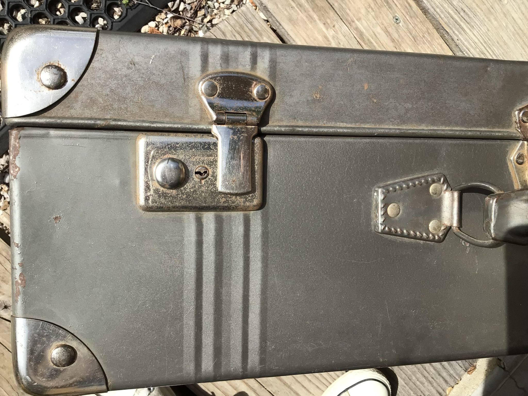 Vintage dark grey metal suitcase