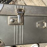 Vintage dark grey metal suitcase