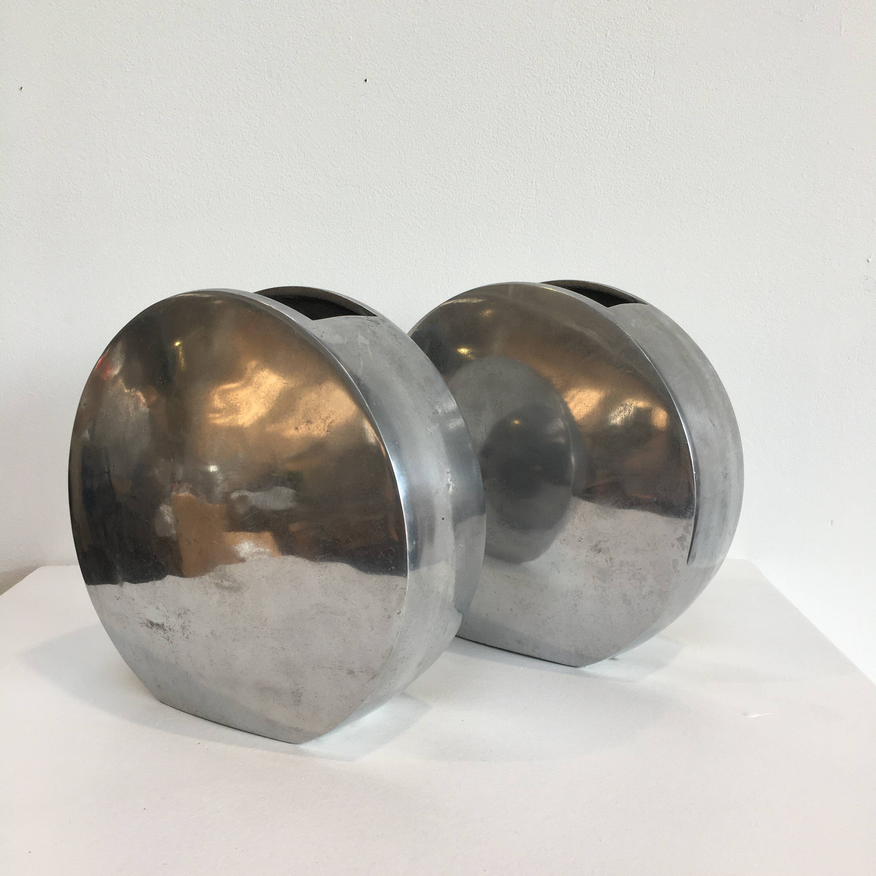 Series of two 70s style aluminum vases