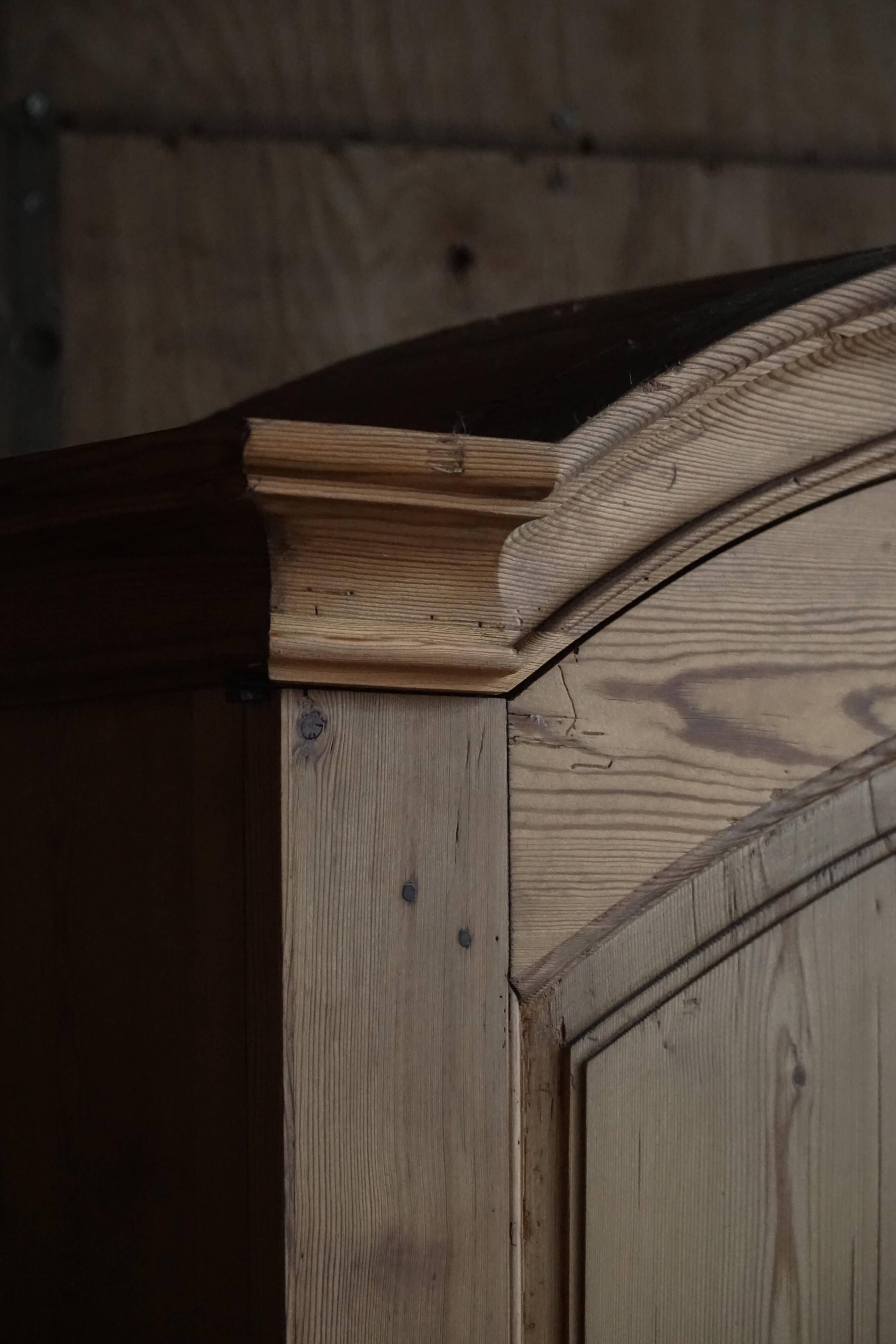 Old Danish secretary in pine with drop-down front and upper cabinet, mid-19th century.