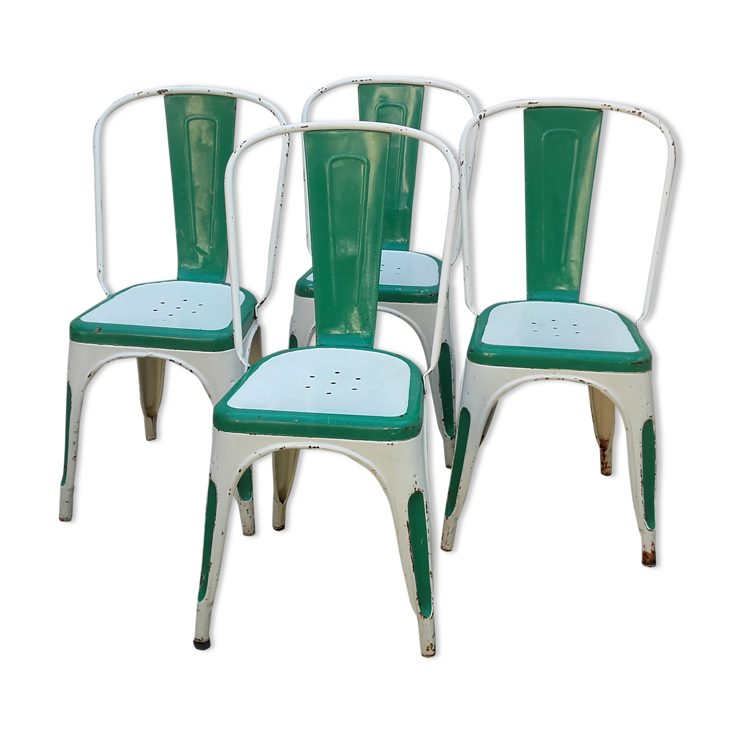 Four old Tolix Model A chairs