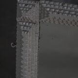 Wall mirror in tramp art style, hand-carved with a painted white frame, early 1900s.