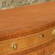 English-made enfilade in Louis XVI style with light wood veneers.