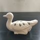Canard pique fleurs blanc
