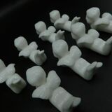 8 porcelain knife rests - Cherubs