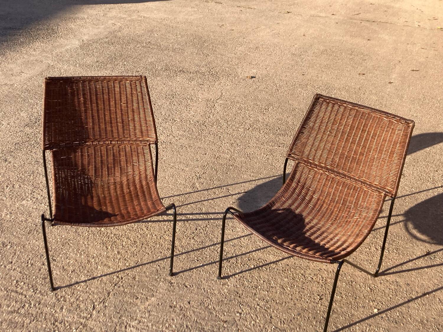 Pair of rattan and steel armchairs