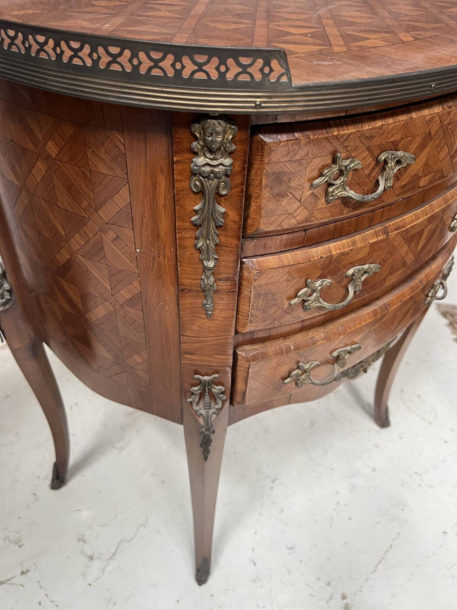 Half-moon commode in Louis XV style with cube marquetry from the 20th century.