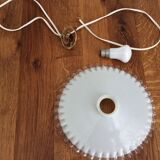 Old suspension in toothed opaline