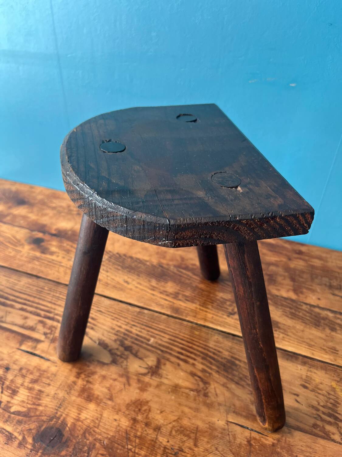 Wooden milking tripod stool