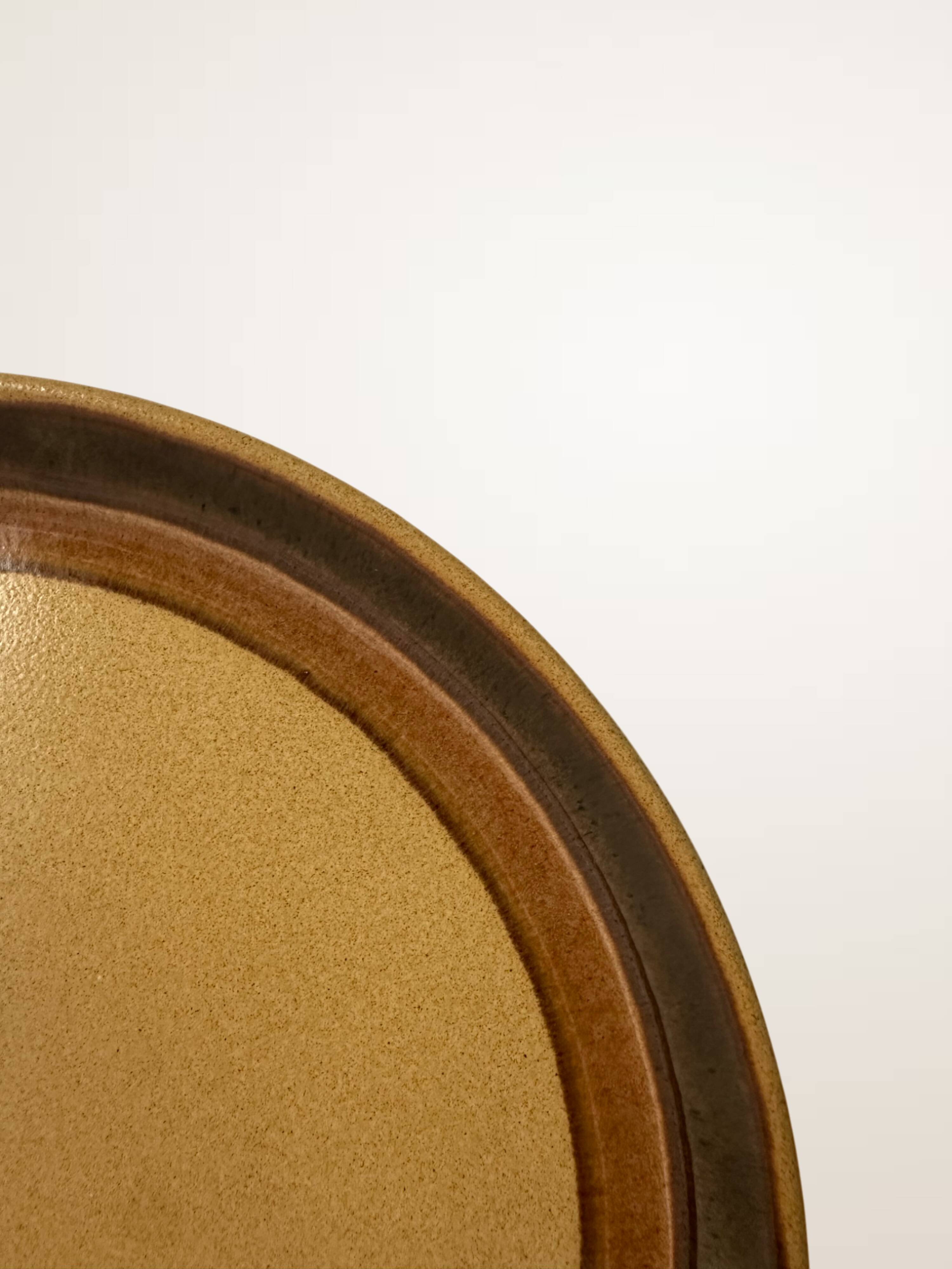 Set of six glazed stoneware dessert plates.