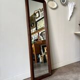 Full-length rectangular mirror in dark wood