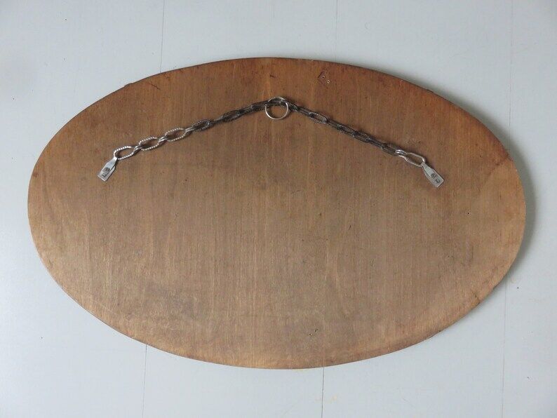 Beveled wall mirror, oval, on wood, with chain Art Deco years 30 40
