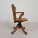 Oak office chair with adjustable spring system and height adjustment, 1950s.