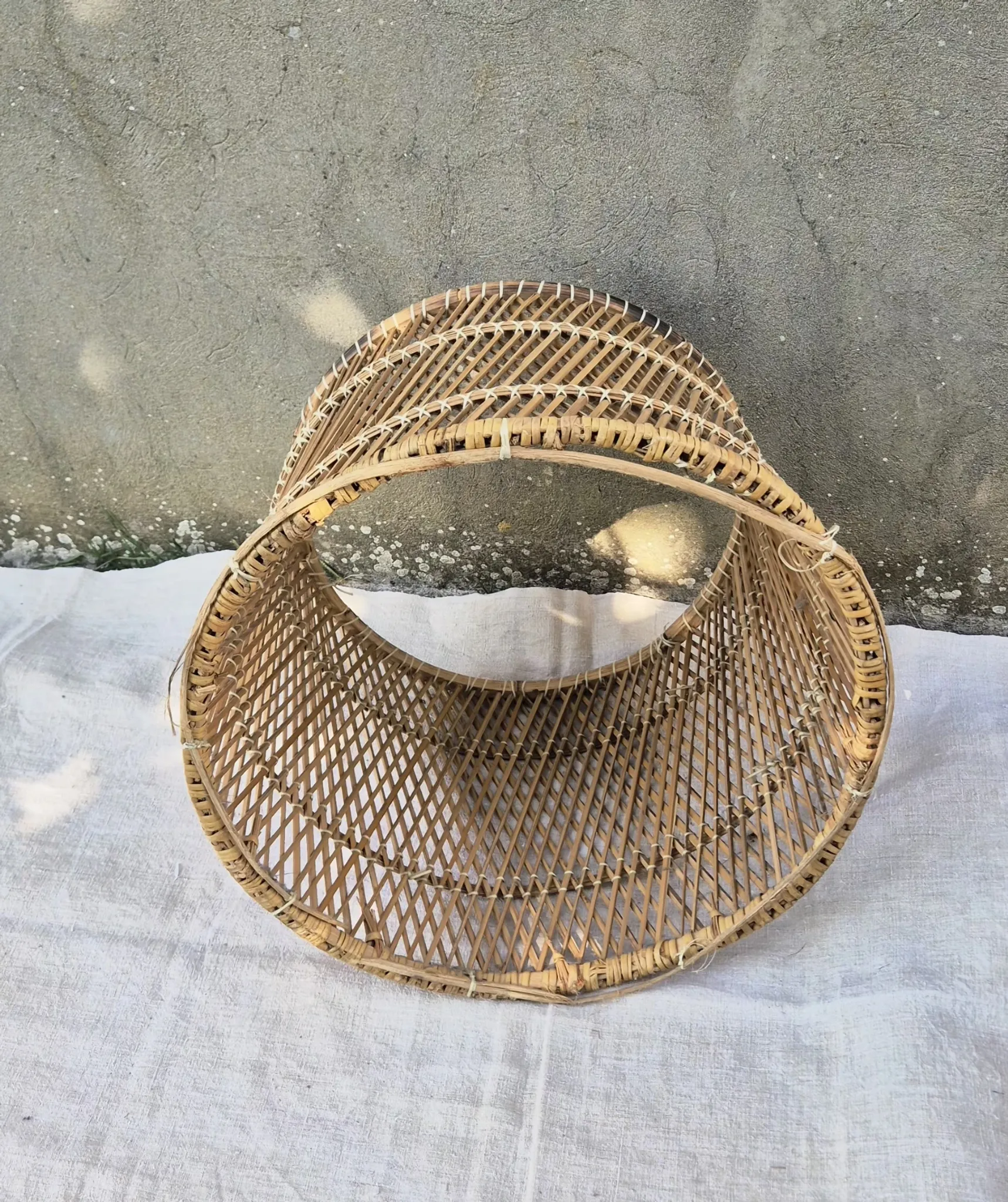 Vintage woven rattan/basket barrel chair
