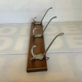 Old coat rack wood metal three hooks