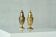 Pair of patinated brass salt and pepper shakers, 20th century.