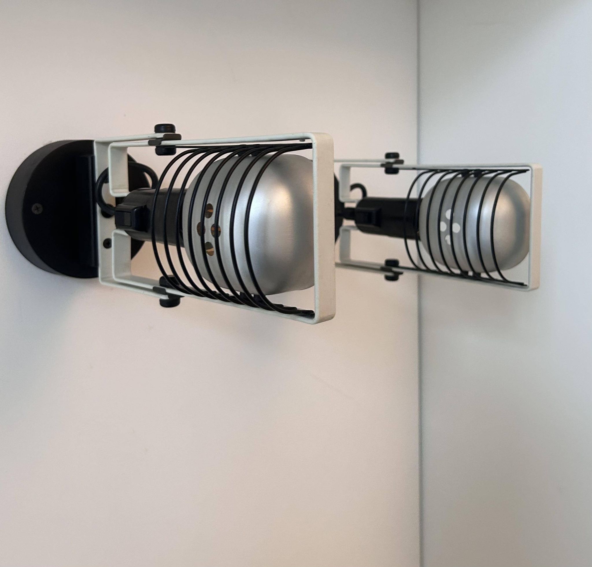 Pair of vintage Sintesi adjustable wall lights, by Gismonti for Artemide, Italy 1975