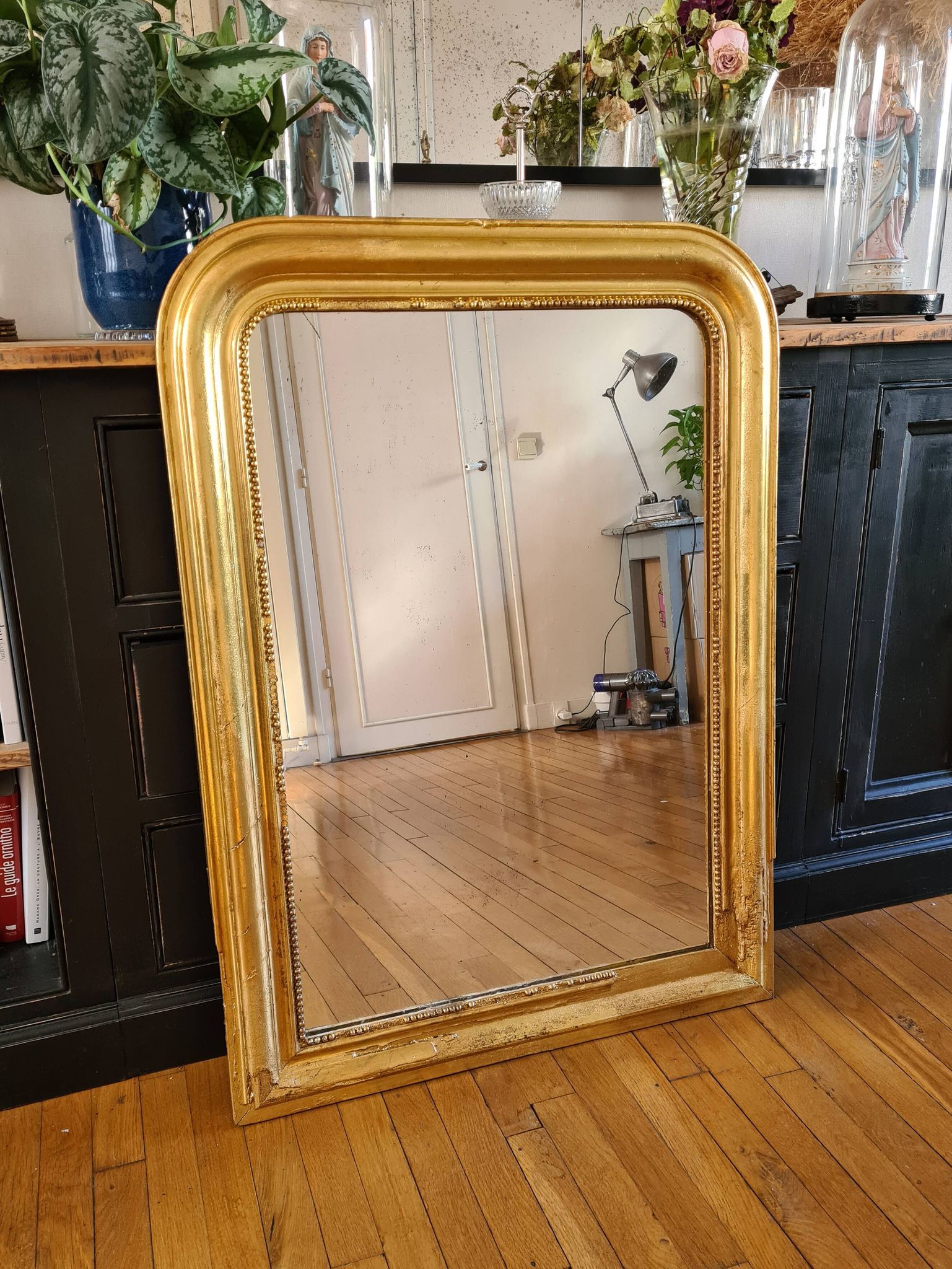 Old Louis Phillipe mercury mirror in gilded stucco with leaf