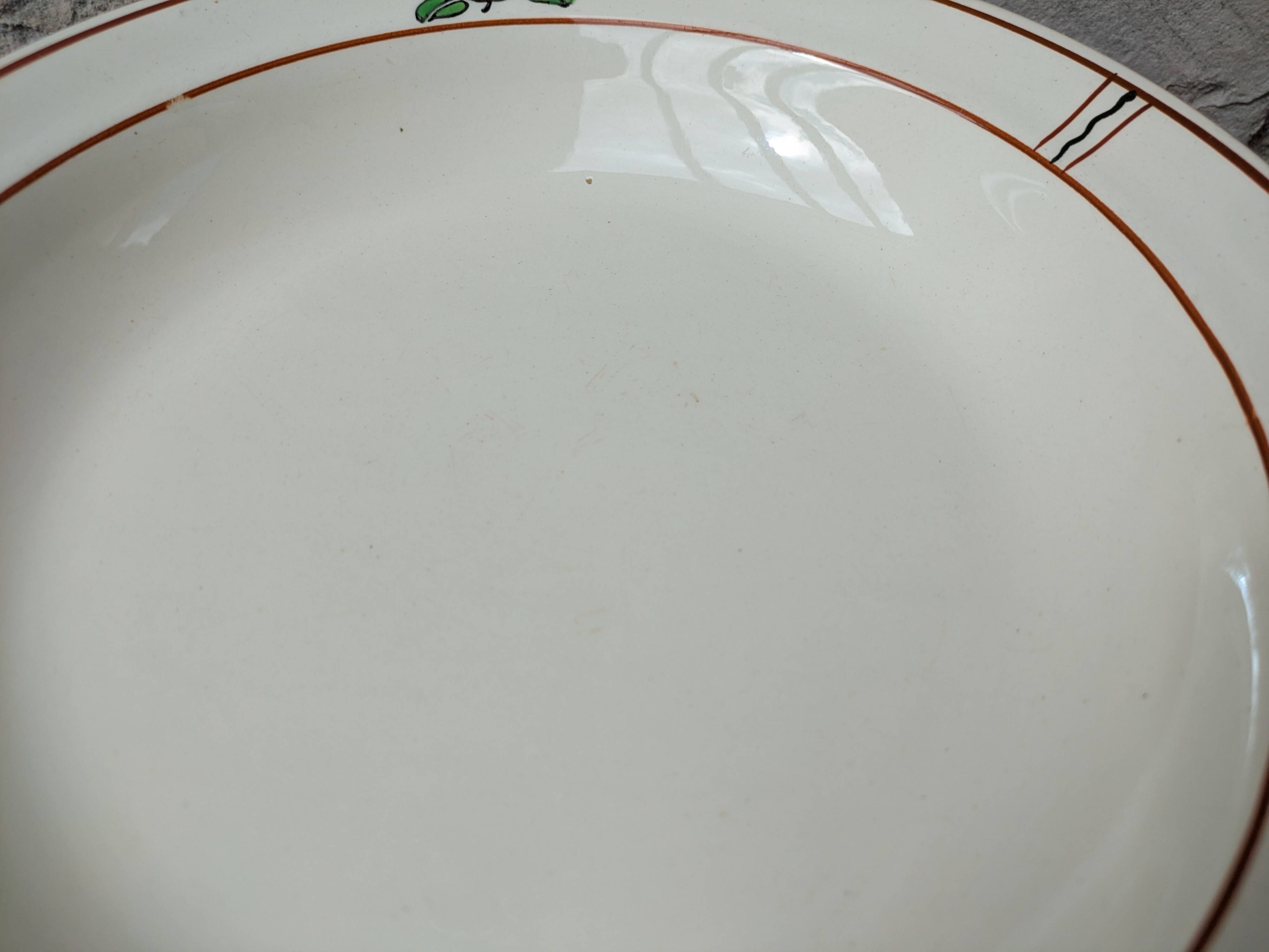 Round hollow serving dish in Salins earthenware model Nénuphar 28.5cm