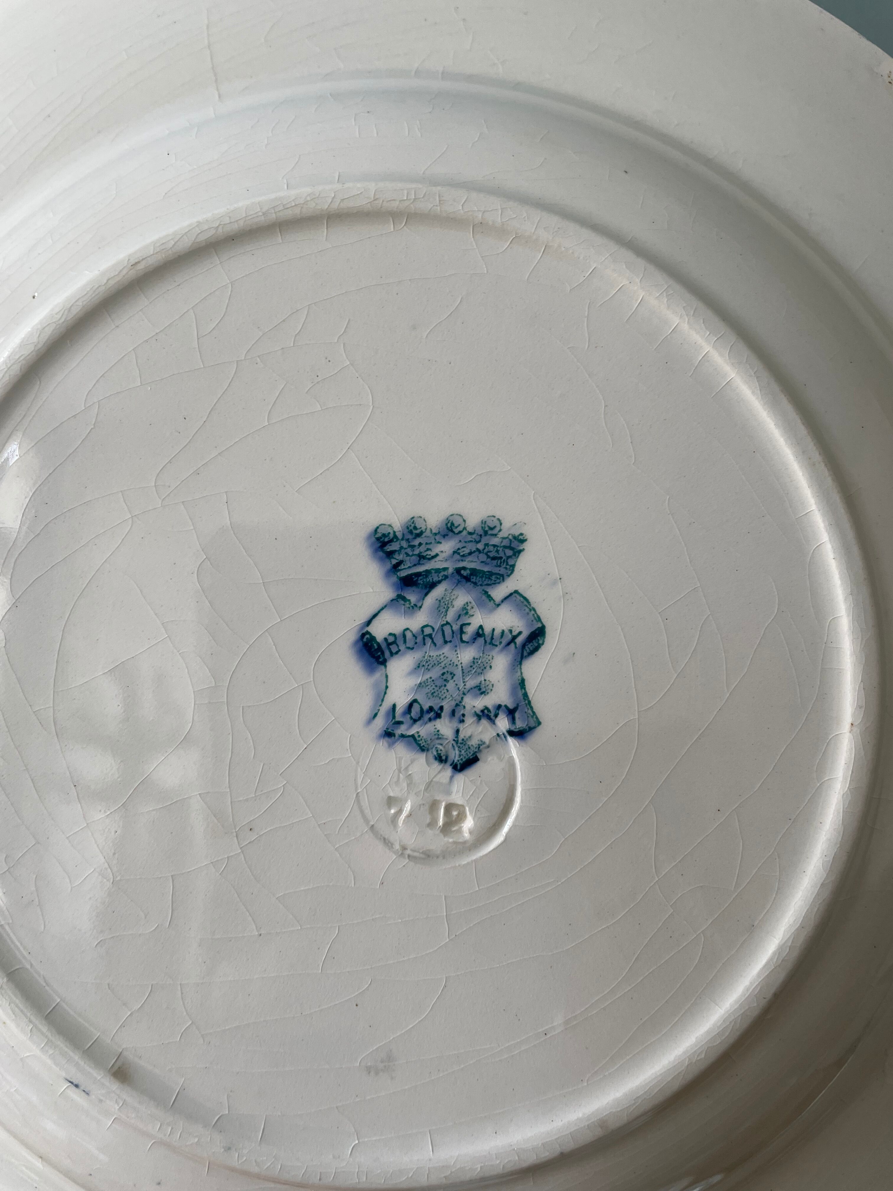 Set of 7 mismatched hollow plates Terre de Fer XIXth