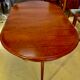 Round or oval table with four chairs in solid cherry, with extensions