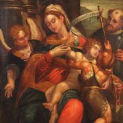Ancient painting of the Virgin and Child on canvas from the 17th century.