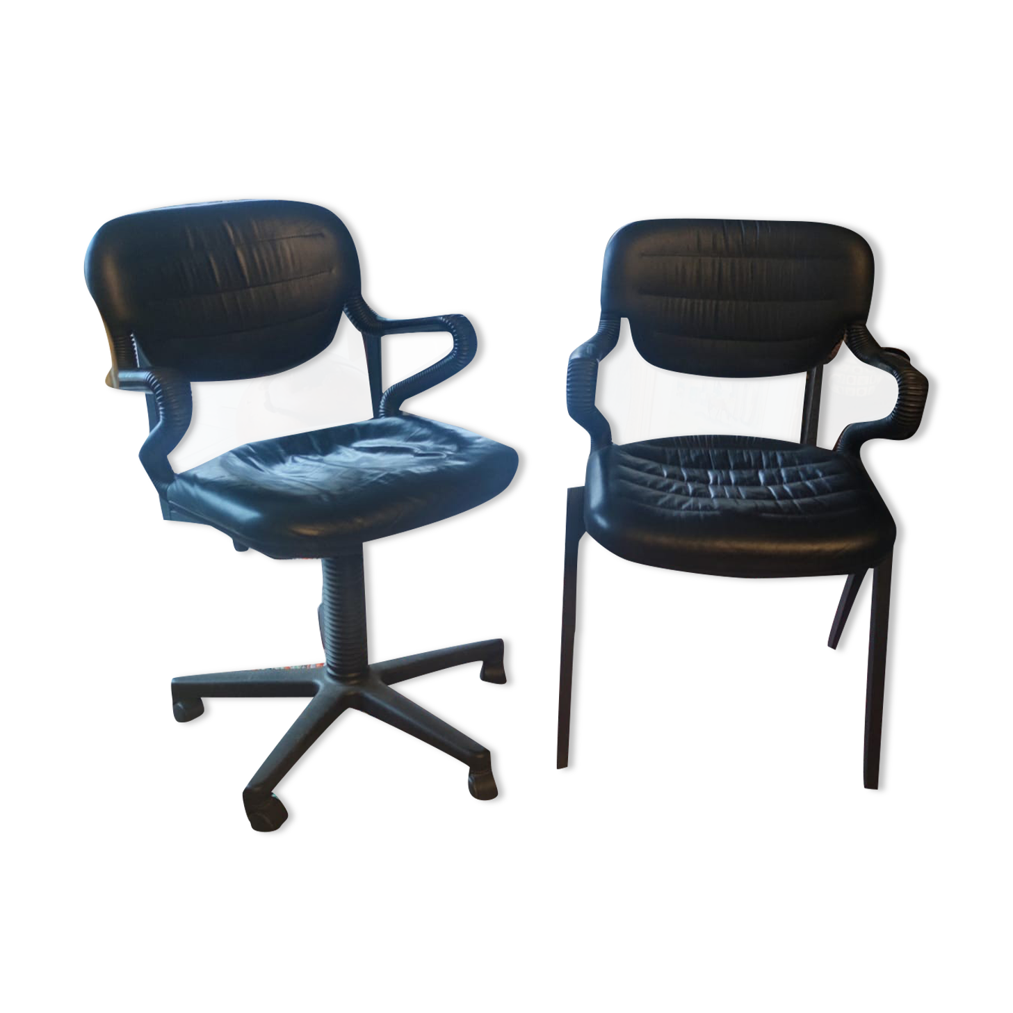 Two black leather armchairs
