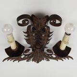 Pair of wrought iron sconces "Venetian masks"